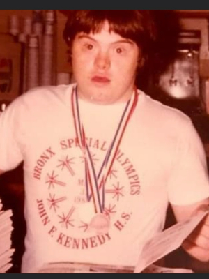 My Great Uncle John Celentano proudly showing off his Special Olympics Medals and Shirt